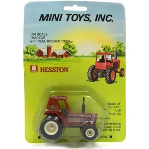 Manufacturer_ERTL Tractors<1/64 Hesston 130-90 Cab with MFD & Real Rubber Tires