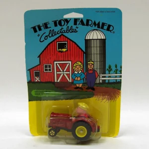 Manufacturer_ERTL Tractors<1/64 Zeke on Rubber Tired Tractor from 1987