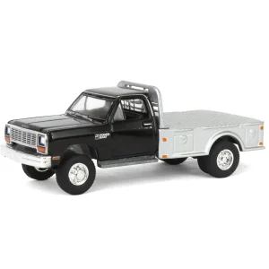 Manufacturer_Greenlight Collectibles Lowboys & Flatbeds | Pickup Trucks<1/64 1985 Dodge Ram W350 Dually Flatbed Pickup Truck, Black with Silver Flatbed, Diecast Direct Exclusive